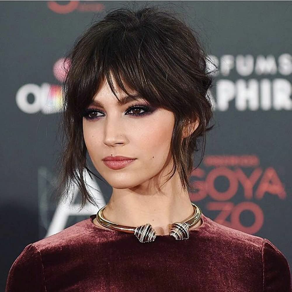 ��rsula Corber��